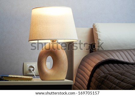 bedroom with lamp on a  night table