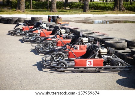 Kart Racing. Cars at pit stop.