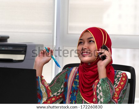 A lady officer on the phone