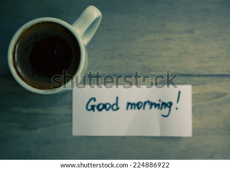 Good morning note and coffee in a cup