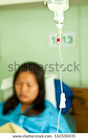 asian woman with saline solution