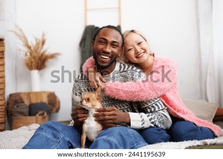 Similar – Image, Stock Photo Diverse couple chilling on floats