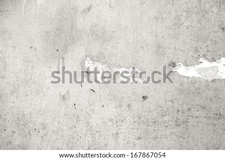 White wall background and tear paper on wall, Old cement  texture.