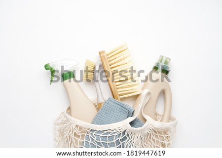 Eco brushes and rag on white background. Flat lay eco cleaning products. Cleaner concept 