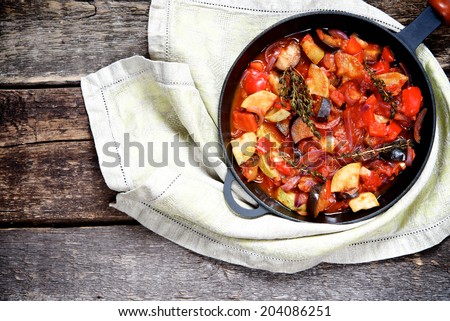 Ratatouille (French dish of vegetables) in a frying pan. top view