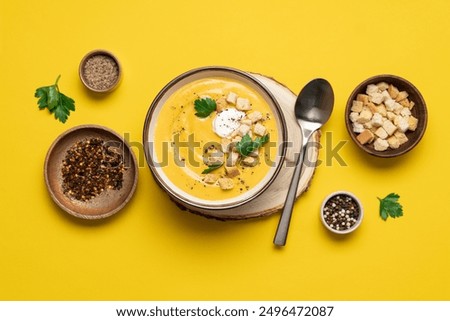 Similar – Image, Stock Photo Orange vegetable cream with slices of carrots and herbs