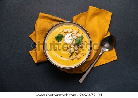 Similar – Image, Stock Photo Tasty pumpkin soup in bowl on table