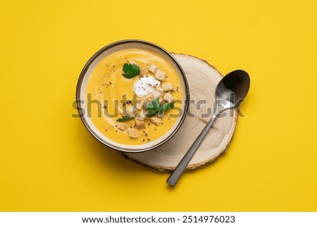 Similar – Image, Stock Photo Tasty pumpkin soup in bowl on table