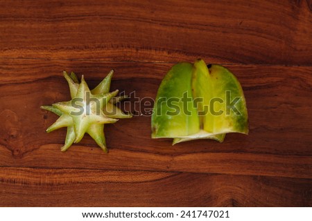 Star apple Carambola (Star Fruit) Fresh ripe star fruit on wooden table