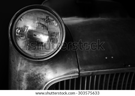 Headlight of a historic car,old vintage car.