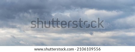 Similar – Image, Stock Photo Gray clouds on sundown sky over sea