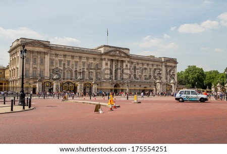 London, UK, July 11, Buckingham palace and English taxi, July 11.2013 in London