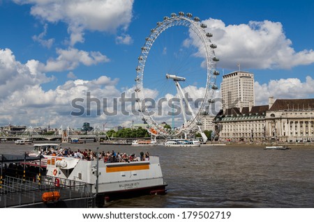 London, UK-July 10, view of the London Eye, tour boat, July 10.2013 in London