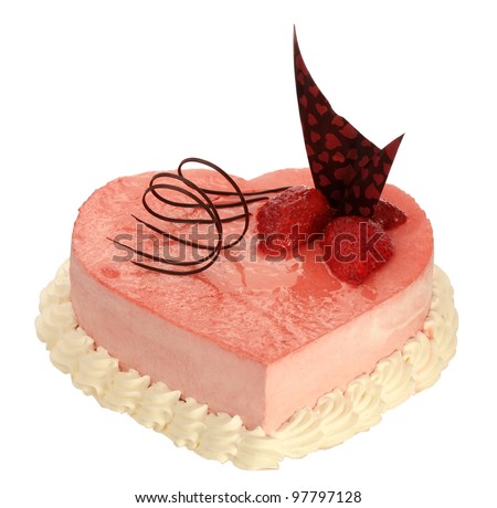 cake in the shape of heart with very on the white background