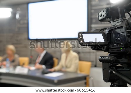Camcorder at a news conference.