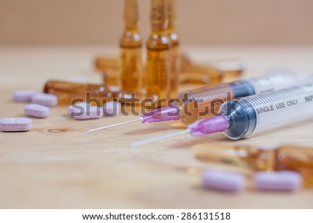 medical ampoule and syringe. Vials of medications