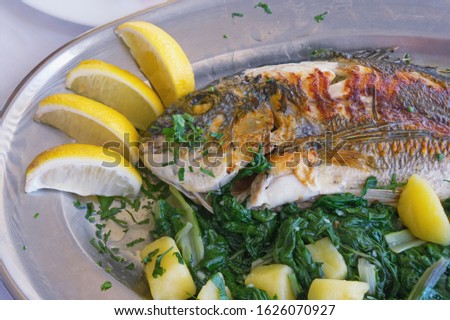 Similar – Image, Stock Photo Grilled fish and potatoes with scallion and sauce