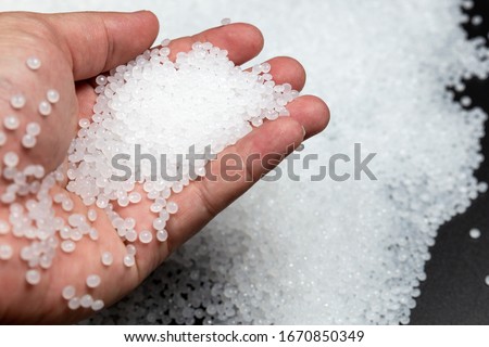 Close-up of plastic polymer granules. polymer plastic. compound polymer.plastic beads