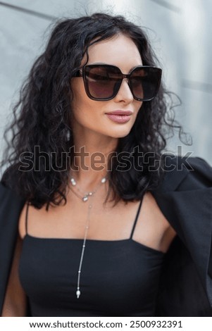 Similar – Image, Stock Photo Stylish woman in sunglasses leaning on building wall