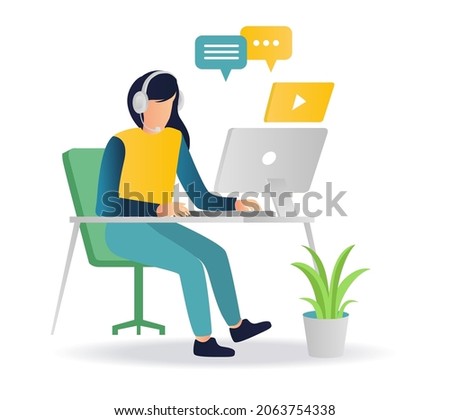 Girl with headset working with computer