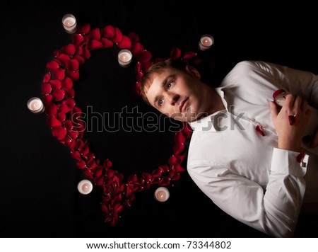 Young handsome man making an offer in romantic atmosphere