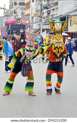 LOEI ,THAILAND-Feb 2 : Demo Festival (Phi Ta Khon) is a type of masked procession celebrated on Buddhist merit- making holiday  at Dog Faay Ban Festival Loei province,Feb2 ,2015