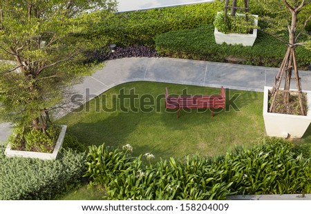 Top view of garden with a bench.