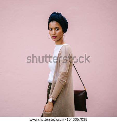 Similar – Image, Stock Photo Young, slim, tall woman with long, blond hair stands in a kitchen leaning against the cupboard and looks into the camera