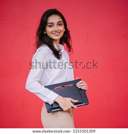 Similar – Image, Stock Photo Young, slim, tall woman with long, blond hair stands in a kitchen leaning against the cupboard and looks into the camera