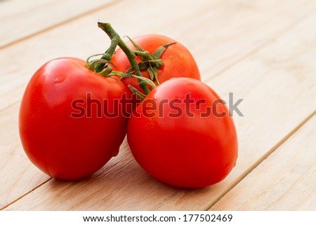 Tomatoes, cooked with herbs for the preservation on the table.