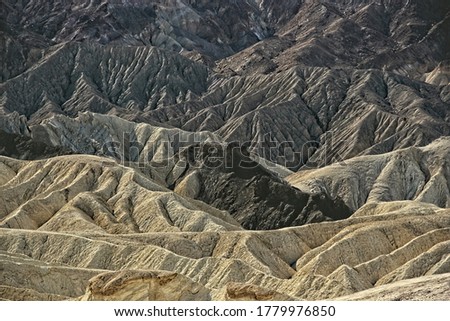 Similar – Image, Stock Photo Sandstone structures at Zabriskie Point in the Death Valley National Park