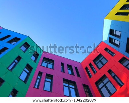 Similar – Image, Stock Photo Colorful facade of an old building with skylights and tile attic