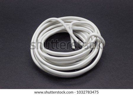 Similar – Image, Stock Photo Wild connected light bulb with cable net in a socket in front of a palm tree