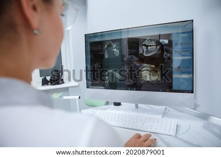 Similar – Image, Stock Photo Crop dentist examining teeth of patient in clinic