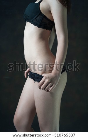 A fragment of woman body in black panties , Lingerie , Underwear, Woman body shape, Female body , Woman body