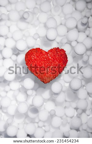 Beautiful winter poster with love red heart. Ice. Snow. Cold. Warm. Merry Christmas. Valentine\'s Day.  New Year. Abstract light snowfall pattern background.