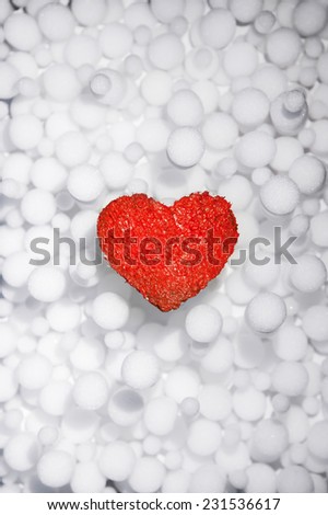 Beautiful winter poster with love red heart. Ice. Snow. Cold. Warm. Merry Christmas. New Year. Valentine\'s Day. Abstract light snowfall pattern background.