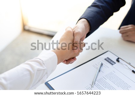 Business people shake hands to congratulate new employees in interviews after meeting in office, job interview Concept. Сток-фото © 