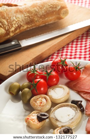 Cold appetizer, plate of assorted cold cuts traditional in mediterranean countries
