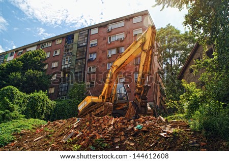 EXcavator machine on construction site during earth moving works