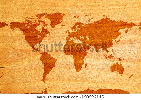 World map on wooden grunge textured background