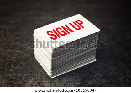 Sign Up Business cards with rounded corners. Stack of blank horizontal business cards propped up another.