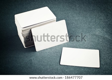 Business cards with rounded corners. Stack of blank horizontal business cards propped up another with copy space for your design. Please, browse my portfolio for more blank business cards images.