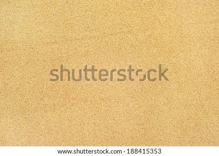 Yellow river sand texture as background, top view