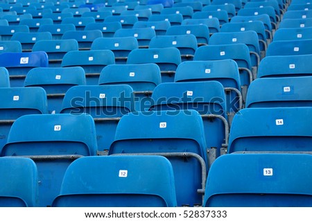 Empty stadium seats at outdoor sports arena, auditorium