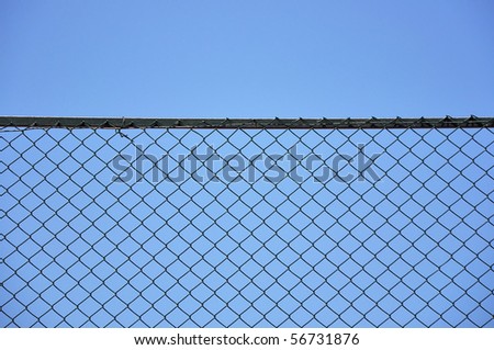 Close up photography of a grid metal net fence.