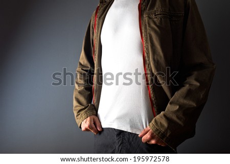 Man in showing white t shirt under his jacket as copy space for your text or design.