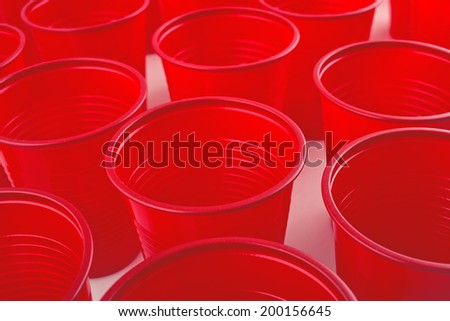 Empty Plastic red cups on picnic table