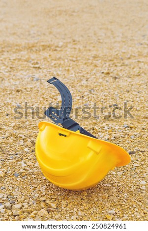 Protective Industrial Safety Helmet on the ground as Accident at Work Concept.