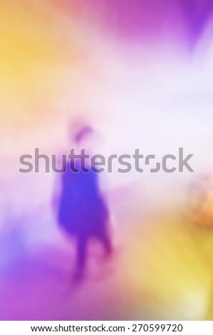 Blurred abstract silhouette of women walking down the stairs in urban environment